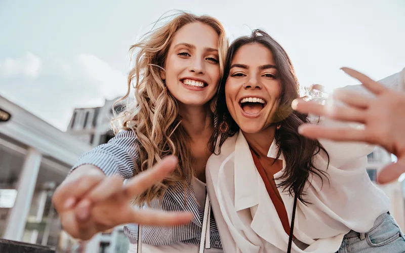 Friends selfie suited to social and ad frames
