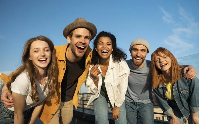 Friends on a rooftop suggesting a batch of photos